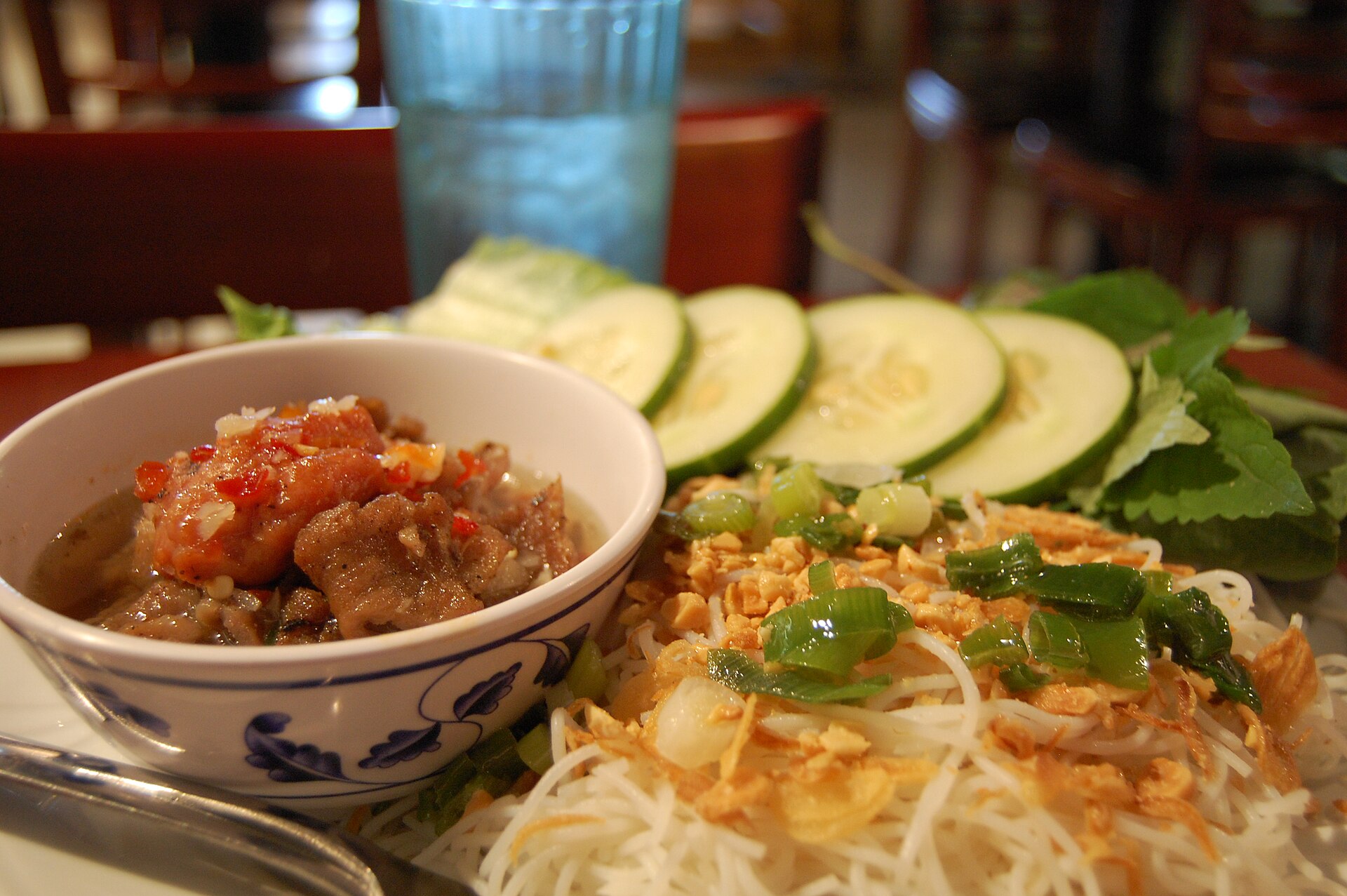 A Vietnamese plate of noodles, herbs and grilled pork